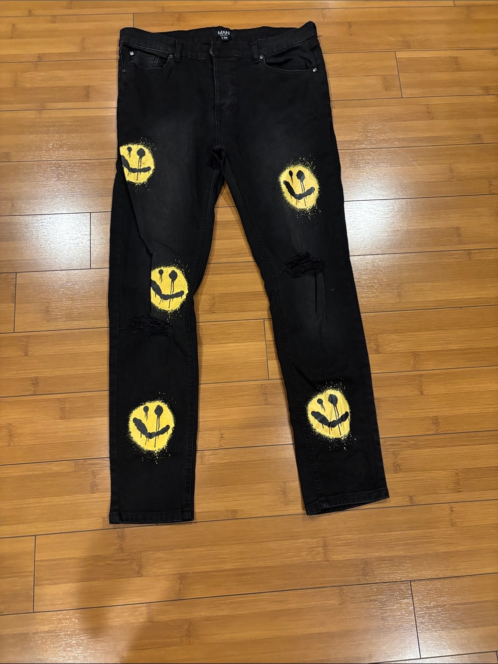Boohoo Black Slim Jeans with Yellow Smiley Graphics